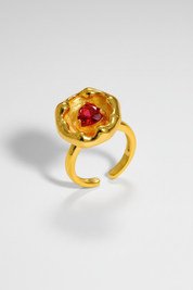 Gold adjustable ring with red gemstone