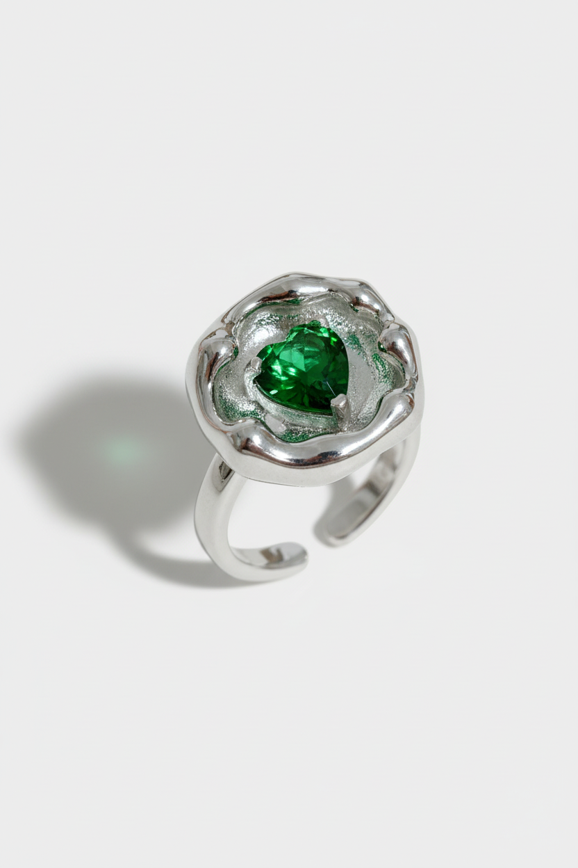 Silver ring with green gemstone